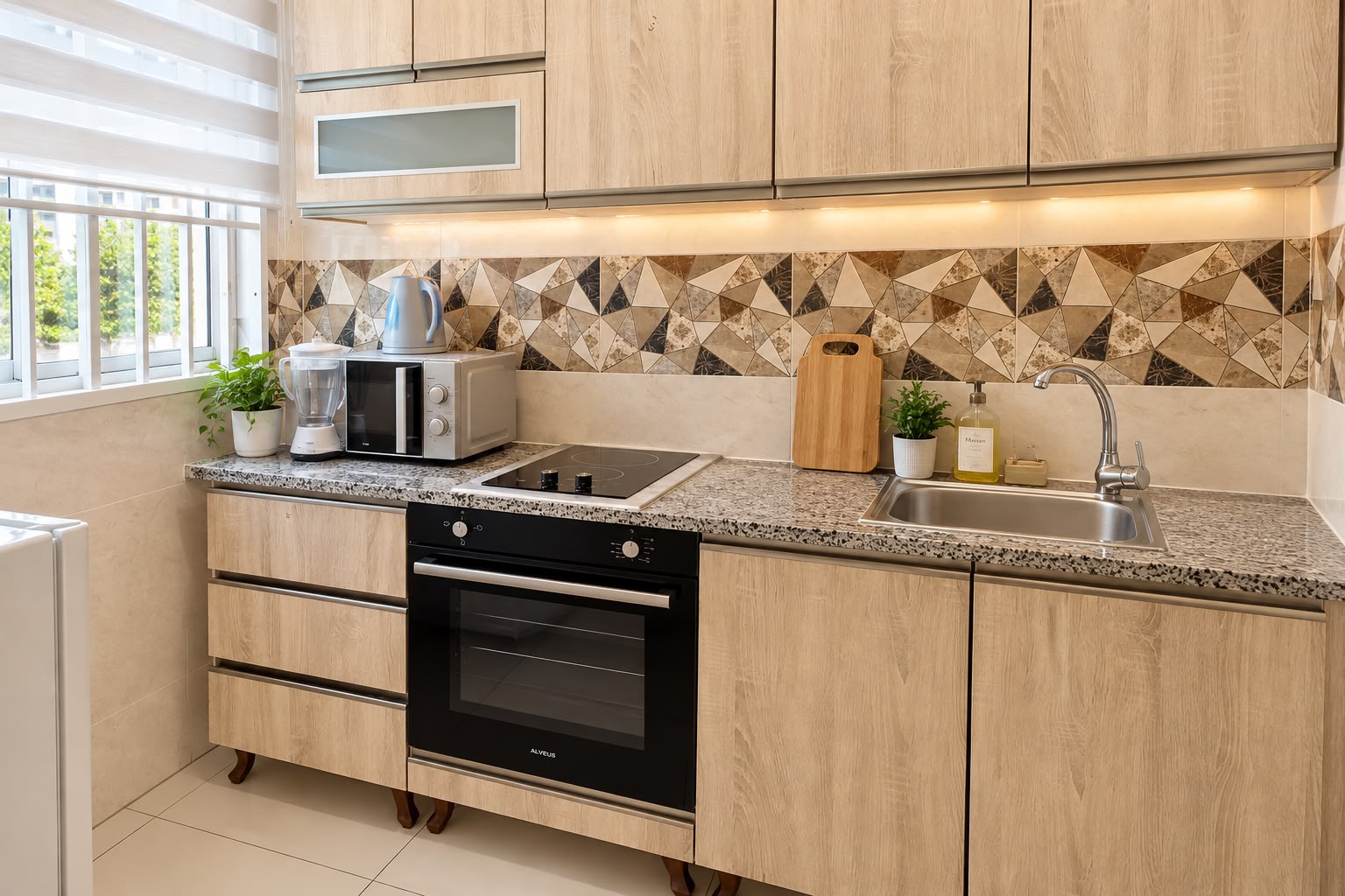 Cuisine équipée d’un appartement ELFA Suites